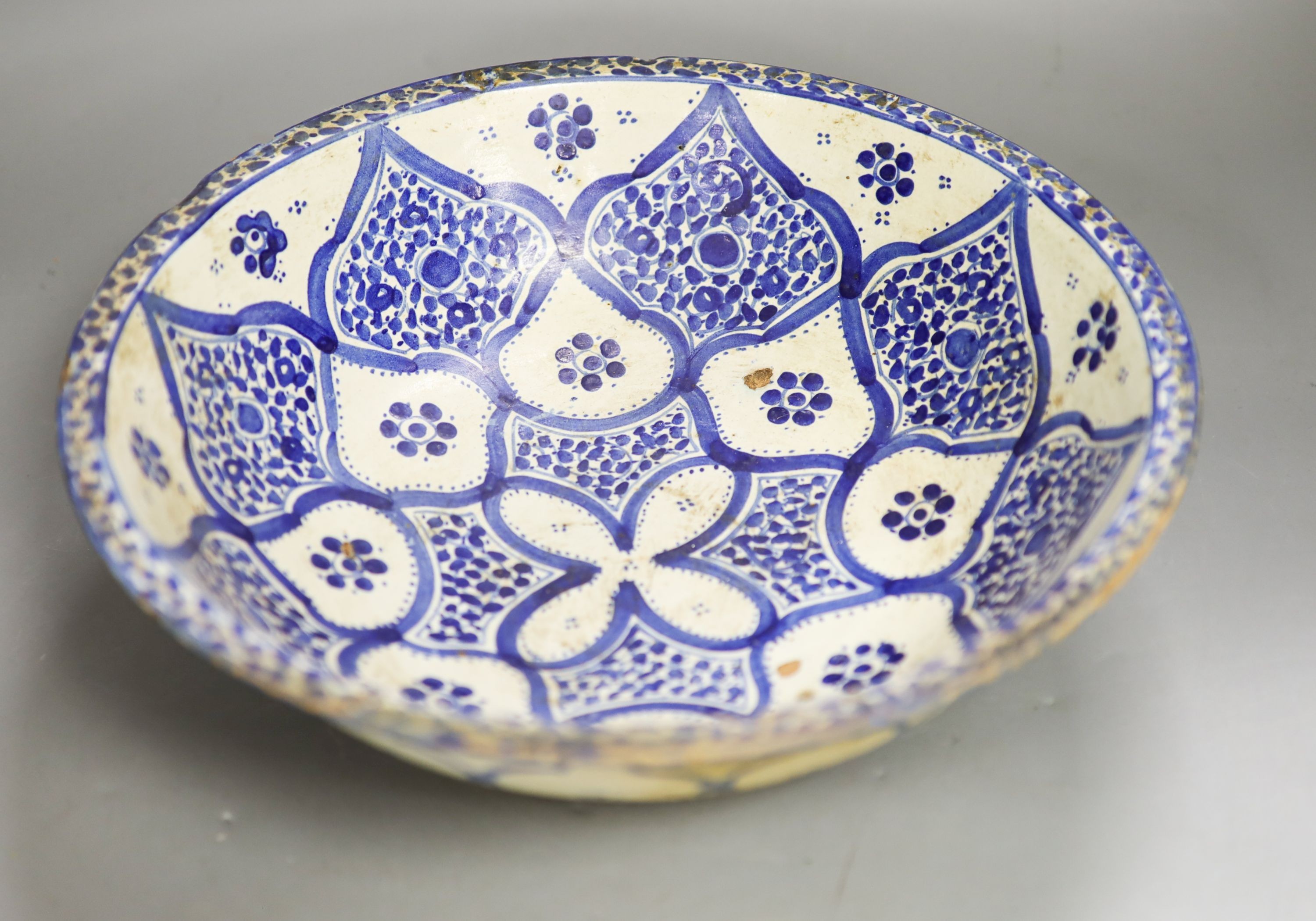 An Iznik style blue and white bowl 30cm